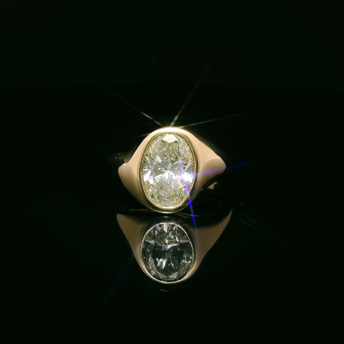 2.5 carat Oval Lab Grown Diamond Gypsy Set Engagement Ring in 18k YG - (VS1/E)