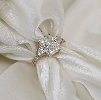 3.02 carat Radiant Lab Grown Diamond Center: 3-Stone in 18k Yellow Gold (VS1/E)