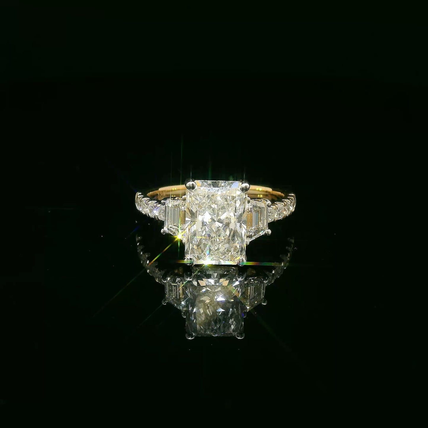 3.02 carat Radiant Lab Grown Diamond Center: 3-Stone in 18k Yellow Gold (VS1/E)