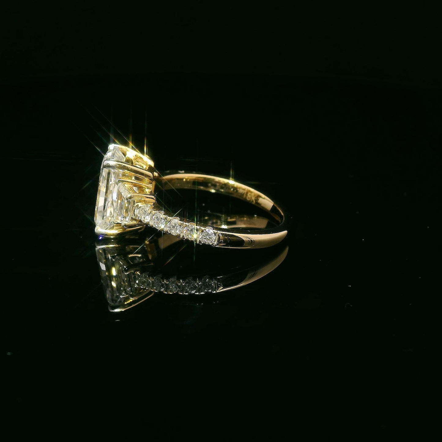 3.02 carat Radiant Lab Grown Diamond Center: 3-Stone in 18k Yellow Gold (VS1/E)
